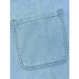 Woman wearing a relaxed denim dress