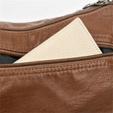 Multi-Zip Shoulder Bag by Eleanor Vale