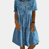 Woman wearing a boho-style button-front denim dress