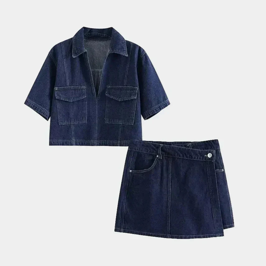 Woman wearing a denim two-piece set with short top and mini skirt