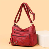 Multi-Zip Shoulder Bag by Eleanor Vale