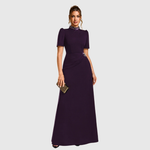 Woman wearing an elegant bridesmaid and evening gown