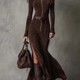 Woman wearing a suede-look zip-front maxi dress