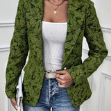 Woman wearing a paisley jacquard blazer