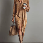 Woman wearing a corduroy button-down shirt dress