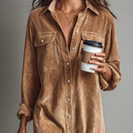 Woman wearing a corduroy button-down shirt dress