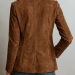 Woman wearing a vintage brown blazer