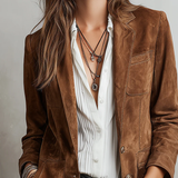 Woman wearing a vintage brown blazer