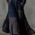 Woman wearing a suede checkered dress with belt