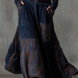Woman wearing a suede checkered dress with belt