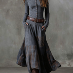 Woman wearing a suede checkered dress with belt