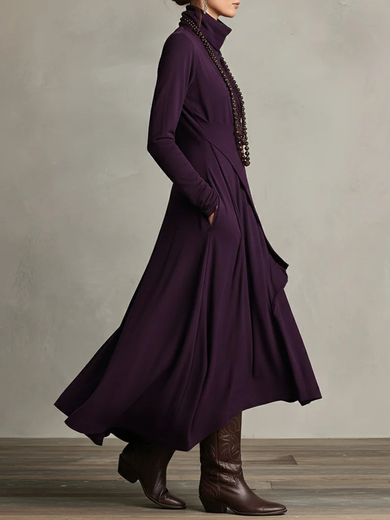 Woman wearing a draped asymmetrical maxi dress