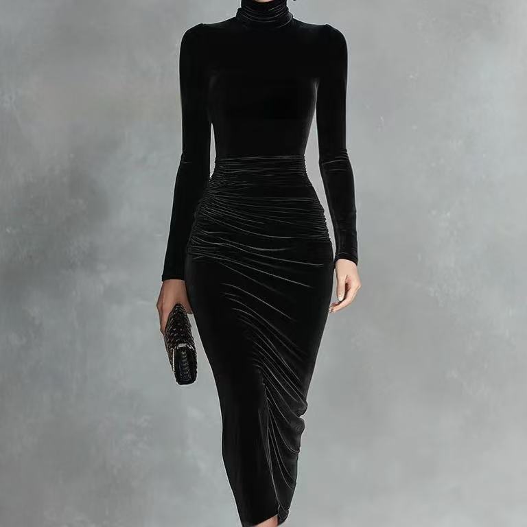 Woman wearing a black velvet fitted dress