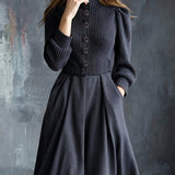 Woman wearing a vintage-inspired winter dress with pockets