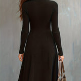Woman wearing a zip-front long-sleeve stretch dress