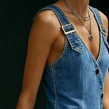 Woman wearing a long button-front denim dress