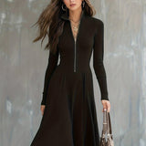 Woman wearing a zip-front long-sleeve stretch dress