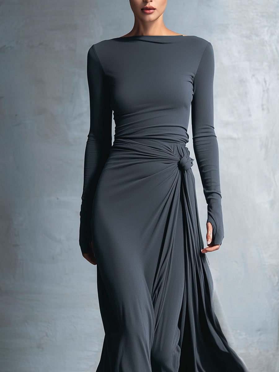 Woman wearing a long-sleeve maxi dress with an adjustable side tie