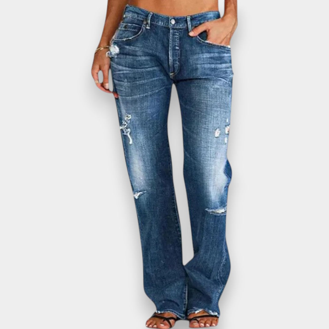 Woman wearing elegant, flattering denim jeans styled for everyday wear