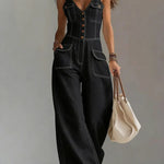 Woman wearing a relaxed-fit denim jumpsuit in a classic wash