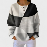 Ella Naturally Warm Patterned Jumper - close-up of black, white and grey colour-block waffle knit with button placket