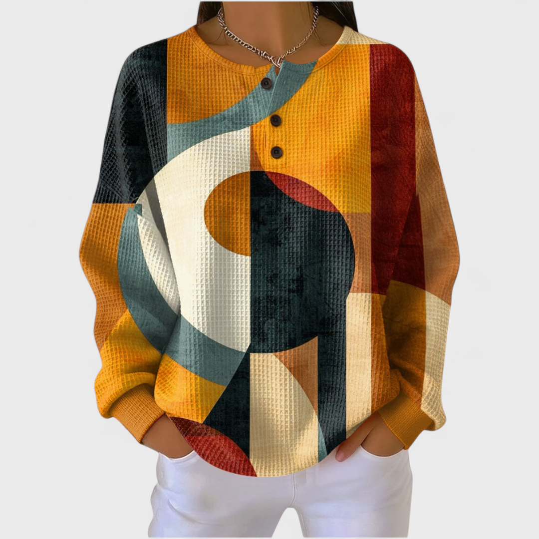 Léa geometric waffle-knit patterned jumper in orange, teal and burgundy colour-block print, front view