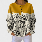 Liv Luxuriously Soft Patterned Jumper - mustard colour-block yoke with abstract dotted print, front view
