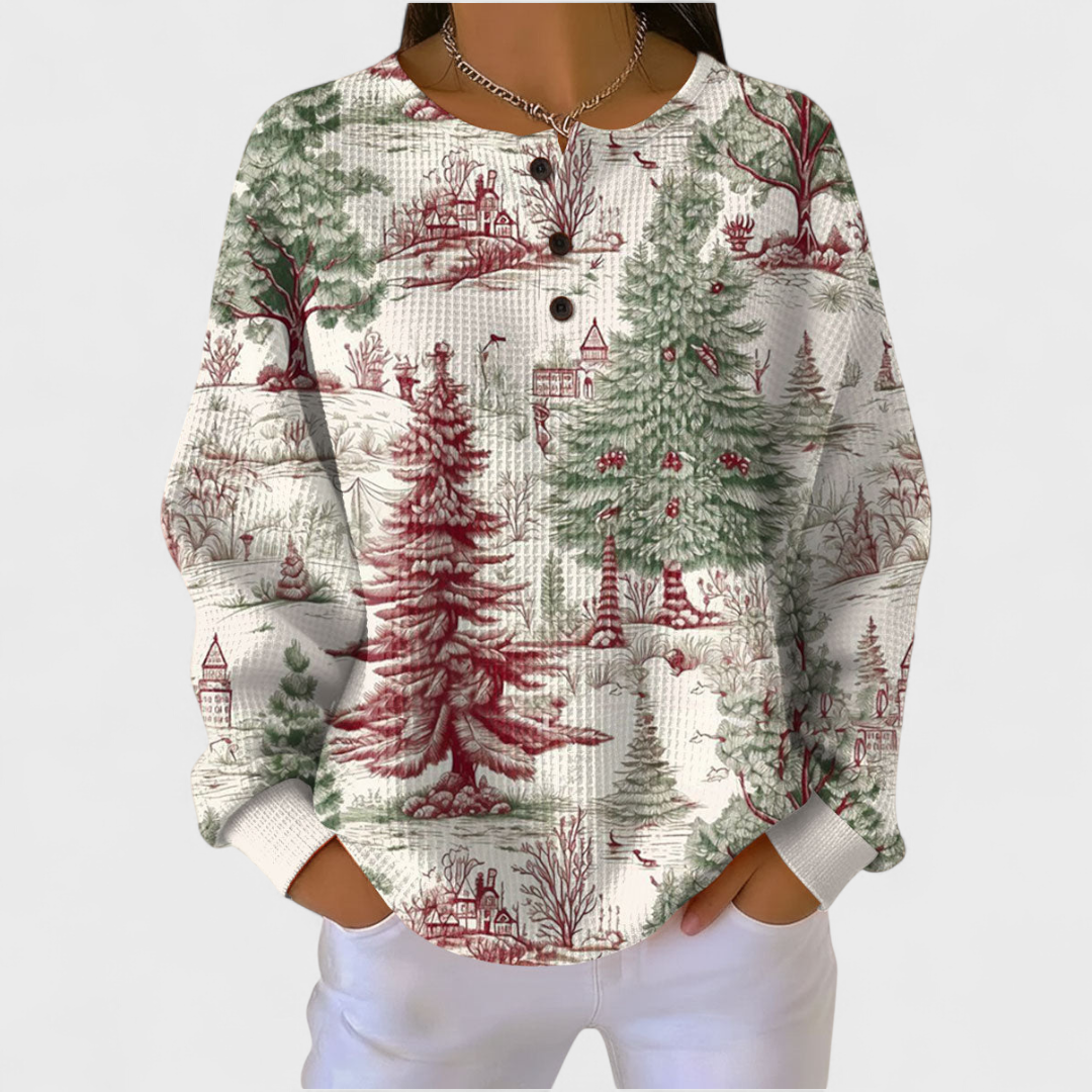 Louna Naturally Comfortable Patterned Jumper - green and red winter village toile print, front close-up