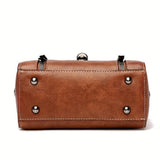 Twist-Lock Shoulder Bag by Eleanor Vale