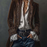 Woman wearing a long embroidered velvet jacket