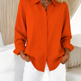 Loose fit collared blouse with concealed buttons