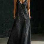 Woman wearing a long button-front denim dress