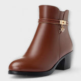 Edith ankle boot side view showing side zip and gold-tone charm strap