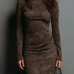 Woman wearing a suede-effect high-neck midi dress
