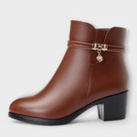 Edith ankle boot profile view showing stacked block heel
