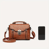 Twist-Lock Shoulder Bag by Eleanor Vale