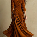 Woman wearing a button-front collar dress with 7/8 sleeves