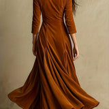 Woman wearing a button-front collar dress with 7/8 sleeves