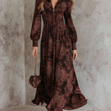 Woman wearing a paisley print zip-waist maxi dress