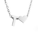 Heart-Letter Necklace by Eleanor Vale