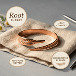 Woman wearing a grooved copper cuff