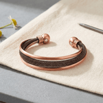 Mesh copper bracelet with coiled ends