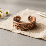 Copper ring with a hand-engraved floral pattern