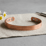 Grooved copper cuff with three hand-pressed channels