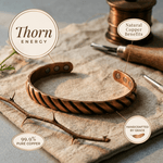Copper cuff bracelet with a hand-pressed desert scene design