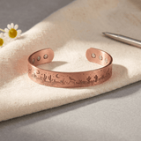 Copper cuff bracelet with a hand-pressed desert scene design