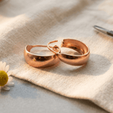Polished copper hoop earrings
