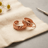 Star engraved copper earrings