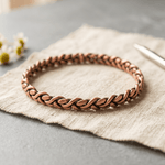 Magnetic link copper anklet laid flat