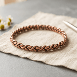 Magnetic link copper anklet laid flat